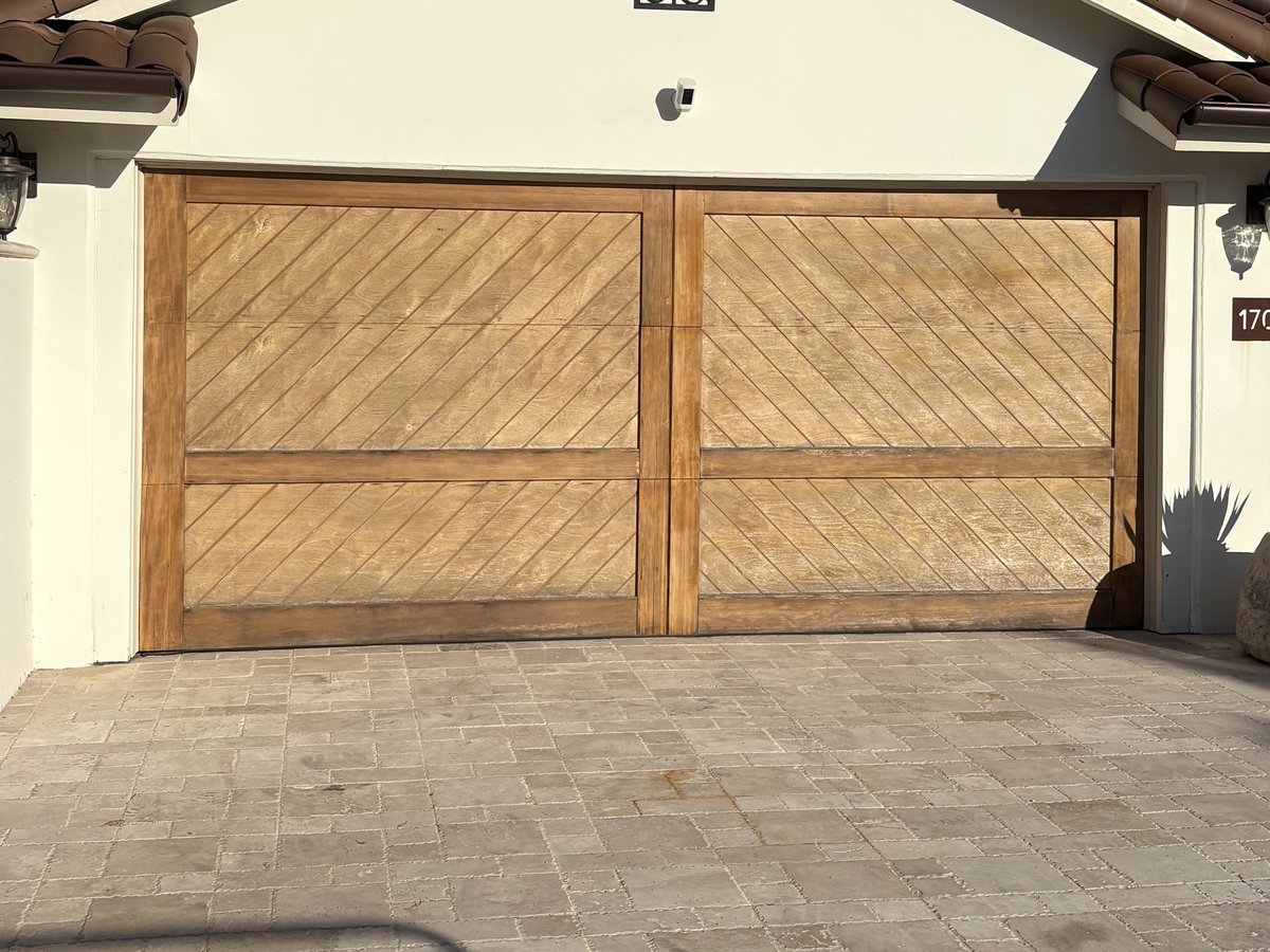 Before: original solid beige garage door