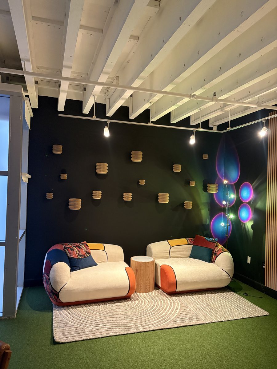 Painted accent wall and finished ceiling in a lounge space