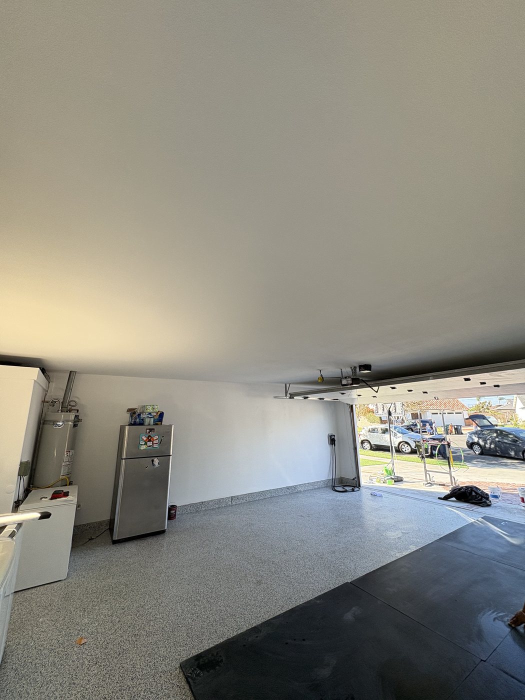 Finished garage after framing repair, drywall and epoxy floor coating, Huntington Beach